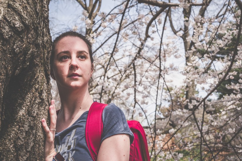 girl amongst cherry blossoms Central Park NYC